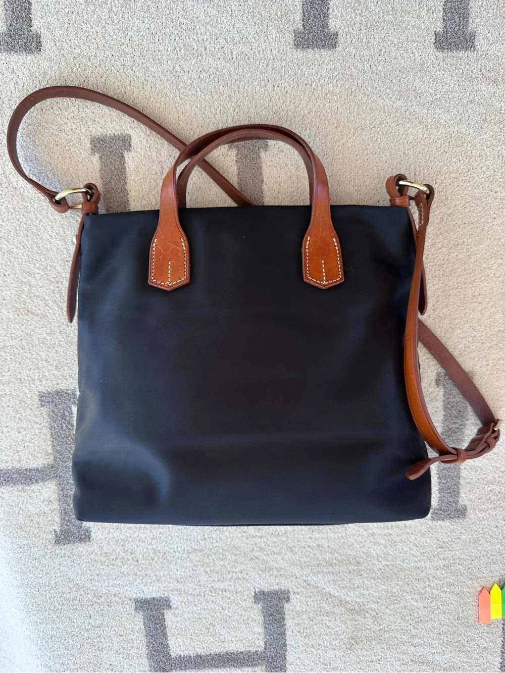 Nylon navy Dooney tote with crossover strap